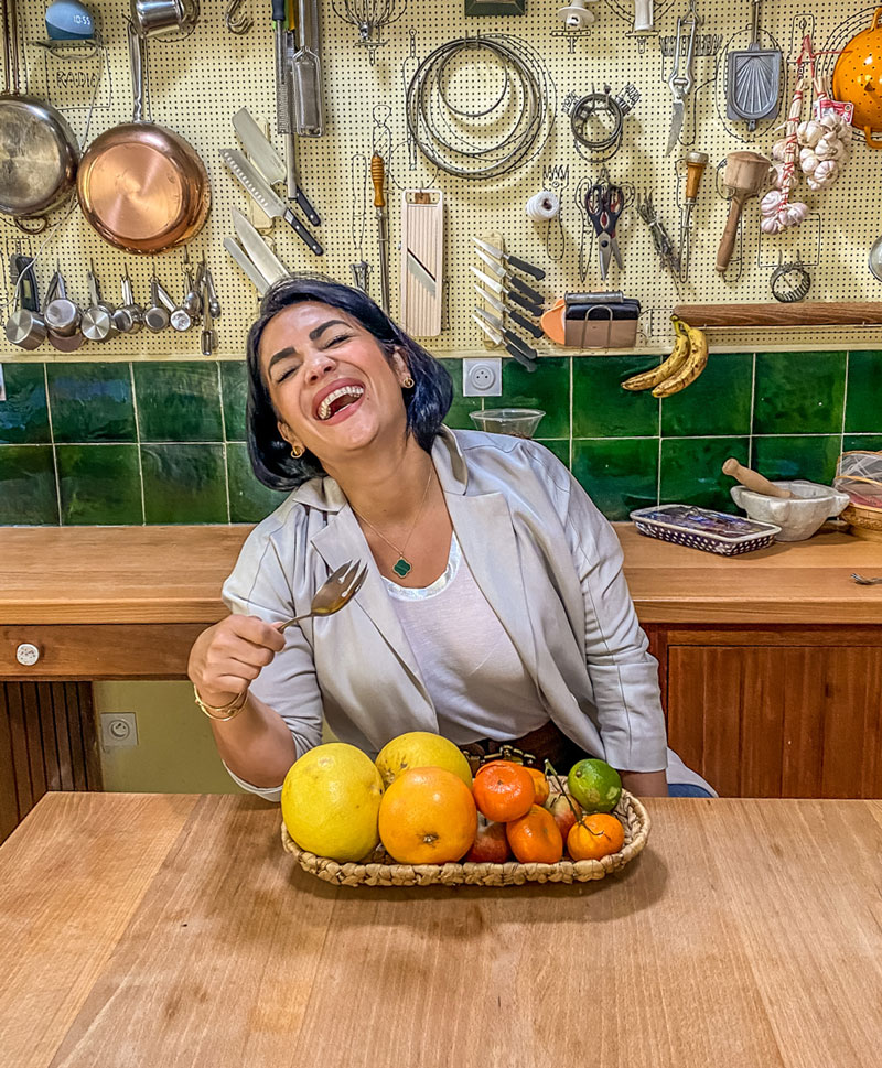 Sayeh-Tavangar next to the kitchen table